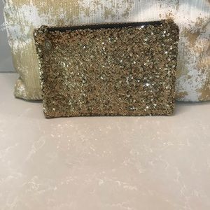 Gold sequin clutch